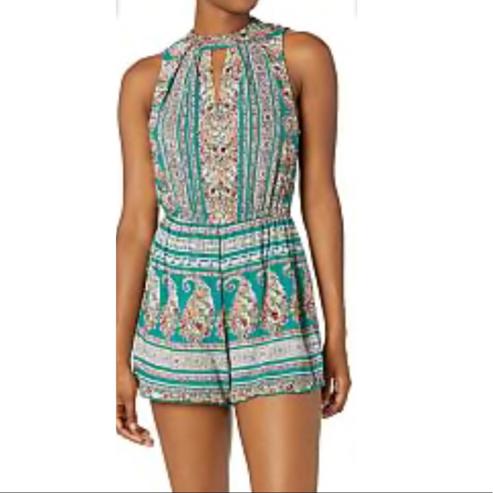 Sleeveless Romper with Open Back.